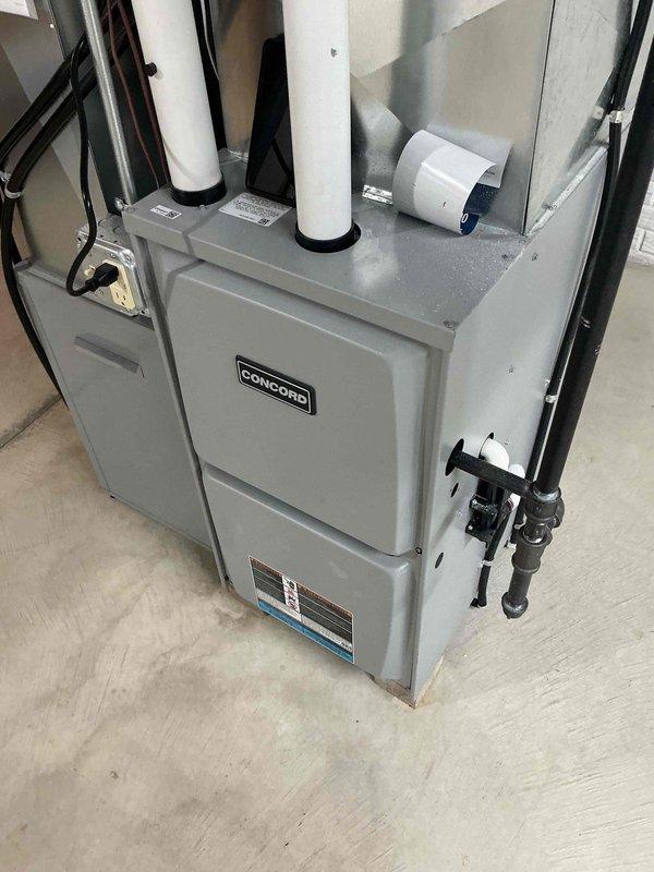 Performed comprehensive tune-up service on Concord furnace system located in basement utility area. Conducted airflow measurements using digital diagnostic tool at supply registers, confirming proper system operation and temperature differential within manufacturer specifications. Inspected all ventilation components, electrical connections, and gas lines for safety and optimal performance.