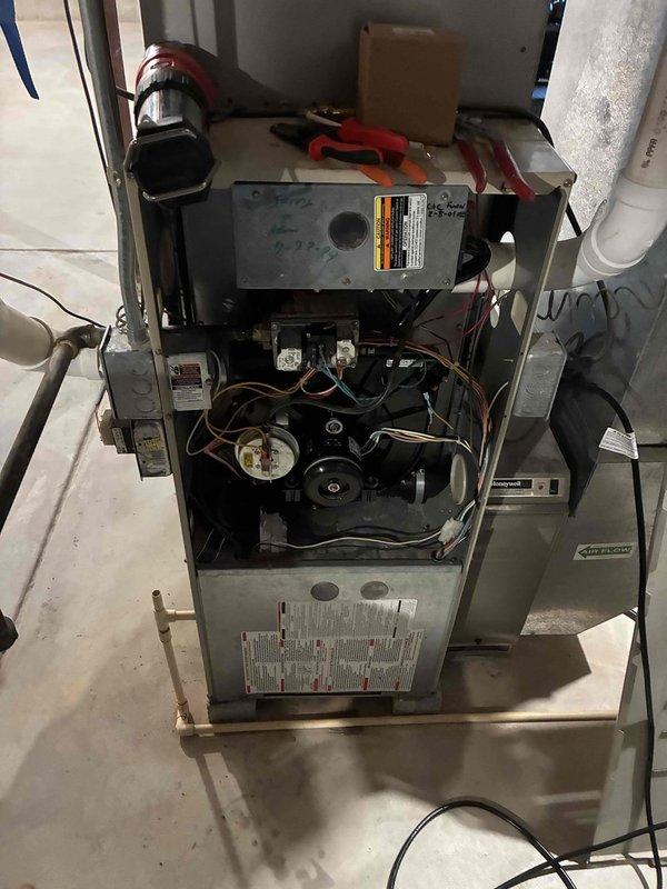 Responded to customer's no-heat complaint on aging furnace system. Upon inspection, found failed igniter preventing proper combustion. Removed access panels, tested electrical components, and replaced faulty ignition assembly with compatible OEM part. System was restored to proper operation with successful ignition and normal heating cycle confirmed during post-repair testing.