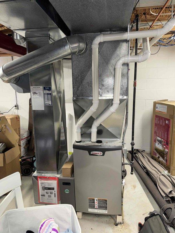 Diagnosed and repaired a Lennox furnace that was failing to produce heat. Upon inspection of the unit installed in the basement, identified a faulty flame sensor which was preventing proper ignition. Cleaned the corroded flame sensor, tested system operation through multiple heating cycles, and verified proper flame detection and heat output restoration.