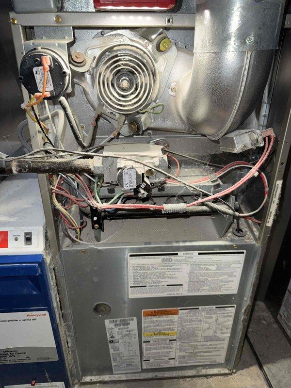 Diagnosed and repaired a "no heat" condition on residential furnace system less than 10 years old. Inspection revealed faulty flame sensor preventing proper ignition sequence. Cleaned flame sensor, restored proper communication with control board, and verified proper heat cycle operation through multiple test cycles before replacing access panels.