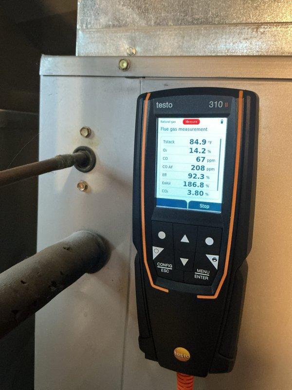 Performed annual maintenance service with comprehensive combustion analysis. System operating at 92.3% efficiency with acceptable levels of carbon monoxide (67 ppm). Surface temperature measurements confirmed proper heat exchange at 82°F. All readings within manufacturer specifications.