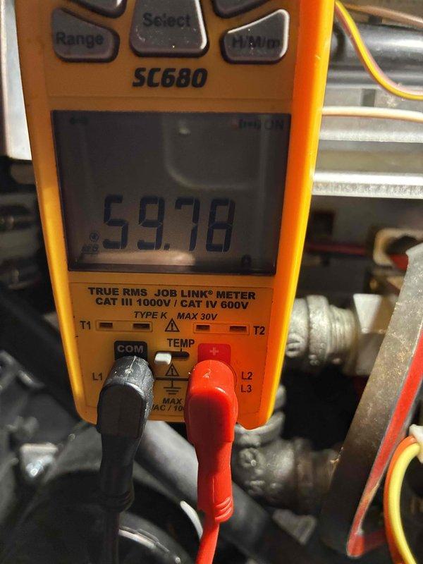 Completed tune-up service on Lennox HVAC system including thorough inspection of all components. Conducted electrical diagnostics using Fieldpiece SC680 multimeter, confirming system voltage at 59.78V which is within acceptable parameters. Verified proper operation of condensate drain system and inspected refrigerant lines for integrity. All systems functioning as designed with no issues detected.