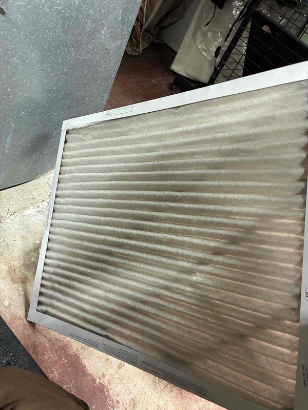 Performed routine HVAC tune-up service including inspection of system components. Replaced dirty air filter with new 20x25x1 filter and verified proper airflow. Temperature readings with digital thermometer showed 64.0°F at supply vent, confirming system is operating within normal temperature parameters.