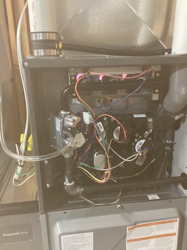 Completed installation of a Honeywell Home furnace with proper gas pressure verification (1.007" WC measured) and comprehensive system testing. Connected all electrical components with proper color-coded wiring and installed PVC venting according to manufacturer specifications. System functioning optimally with all safety features verified.