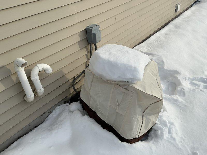 Completed installation of a new furnace system in residential basement, including proper connection to existing ductwork and water heater. System features dual PVC vent pipes exiting through exterior wall and a protected outdoor unit. All components were properly installed according to manufacturer specifications and tested for optimal performance.