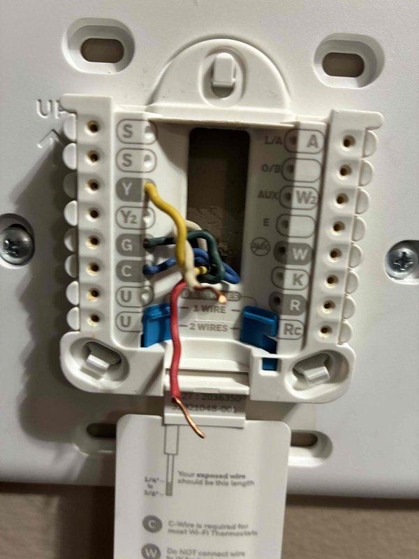 Responded to no-heat call for system less than 10 years old. Identified thermostat issue showing 51°F on Honeywell Home ProSeries display. Inspection of wiring connections at thermostat backplate revealed loose C-wire connection. Secured all wiring connections properly and verified system operation before departure.