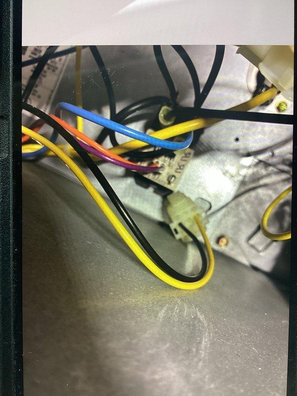 Performed diagnostic inspection of control wiring inside unit. Examined multiple connection points including terminal blocks and control board. All wires were properly routed and secured with no signs of damage or loose connections. System now operating according to specifications.