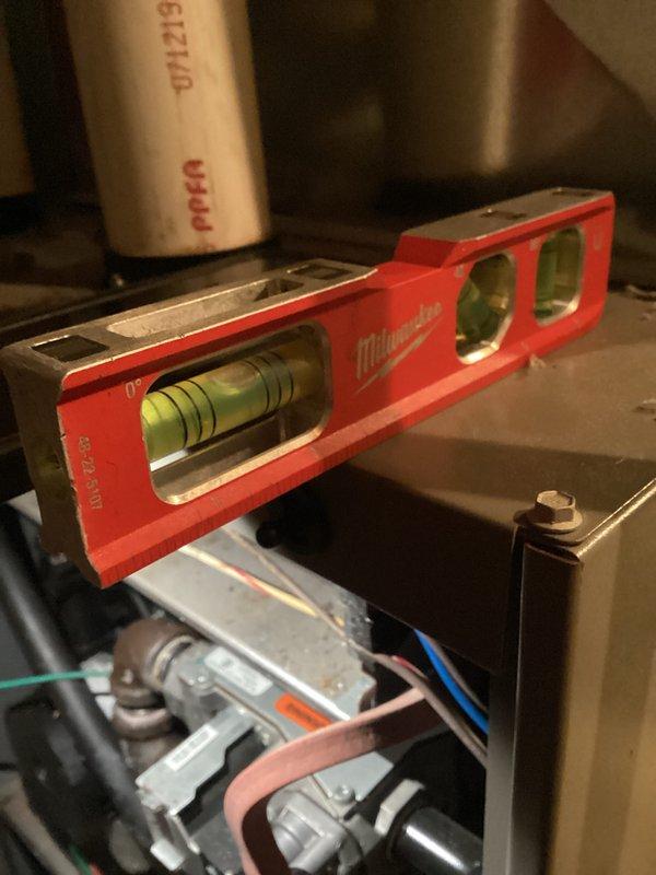 Performed complete tune-up on HVAC system. Inspected interior components including wiring connections, copper lines, and drainage assembly. Confirmed unit is properly leveled using precision tools, ensuring optimal operation and efficiency.