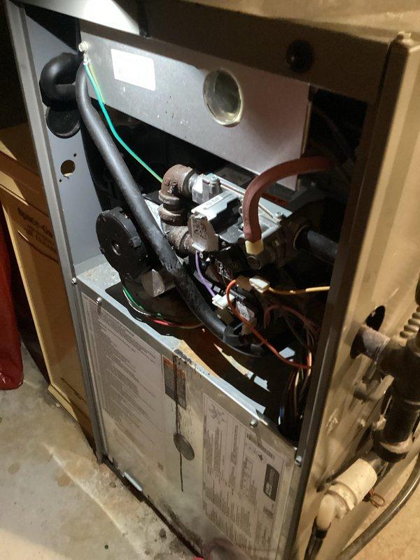 Performed complete tune-up on HVAC system. Inspected interior components including wiring connections, copper lines, and drainage assembly. Confirmed unit is properly leveled using precision tools, ensuring optimal operation and efficiency.