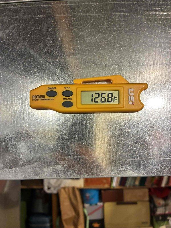 Performed comprehensive HVAC system tune-up including temperature differential testing between supply and return air. Measurements indicated proper system operation with a 53.2°F temperature split (126.0°F at supply side, 72.8°F at return), confirming efficient heat transfer and acceptable refrigerant charge levels.