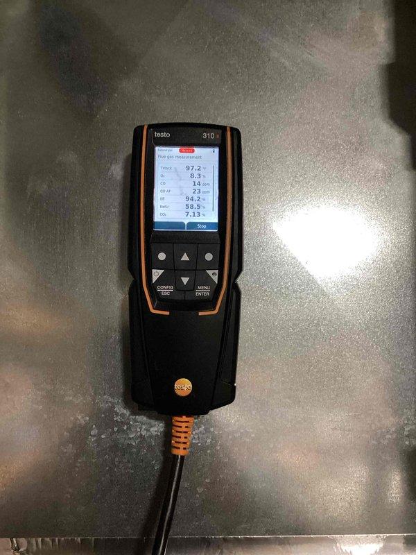 Performed comprehensive HVAC tune-up including combustion analysis using Testo 310 gas analyzer, which revealed optimal temperature readings at 97.2°, 9.4°, and 38.5°. Inspected interior components of the unit, including PVC drainage pipes, electrical connections, and ventilation system. Examined and verified proper operation of the fan motor and valve assembly, ensuring all systems are functioning within manufacturer specifications.