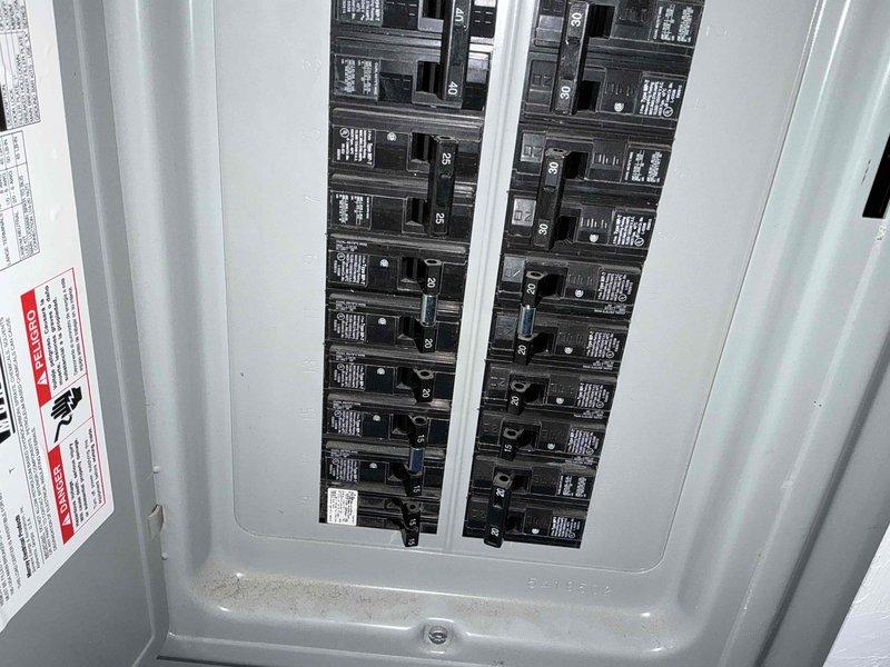 Conducted evaluation of electrical infrastructure to prepare for HVAC system replacement. Inspected existing electrical panel for compatibility and proper circuit configurations. Documented current equipment specifications from manufacturer labels to determine appropriate replacement unit parameters. Verified electrical capacity requirements for new installation will be met by existing panel.