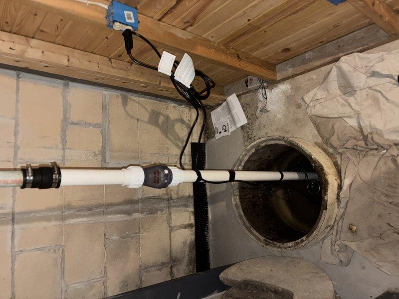 Installed new sump pump system in basement, including proper PVC discharge piping and electrical connections to control unit. Removed debris from sump pit and verified proper operation of the system with successful water evacuation.