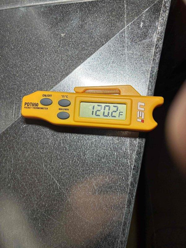 Performed system tune-up service on HVAC equipment. Conducted electrical diagnostics using SC680 multimeter, measuring amperage draw at 3.6 μA DC. Temperature verification with PDT650 thermometer confirmed supply air temperature of 120.2°F, which is within normal operating parameters.