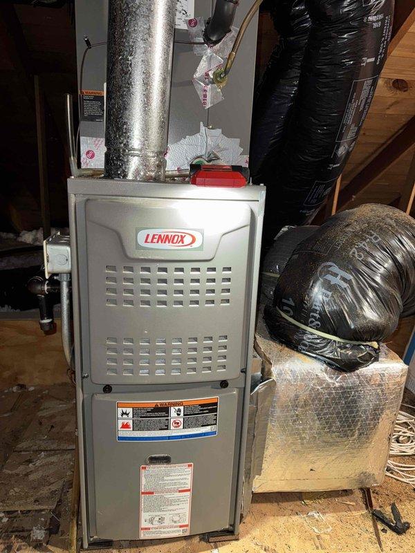 Responded to no heat complaint on newer Lennox system installed in attic. Inspected furnace and found failed igniter preventing proper operation. Replaced igniter, verified proper ignition sequence, and confirmed system is now operating within manufacturer specifications with adequate heat output.