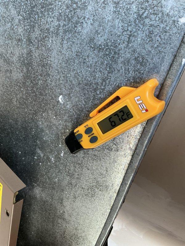 Conducted standard HVAC tune-up which included diagnostic testing with UEi meter showing temperature reading of 672. Inspected control board and wiring, confirming proper connection of control wires (red, yellow, and blue) to circuit board with LED indicators functioning normally. No issues detected with the system electronics or control components.