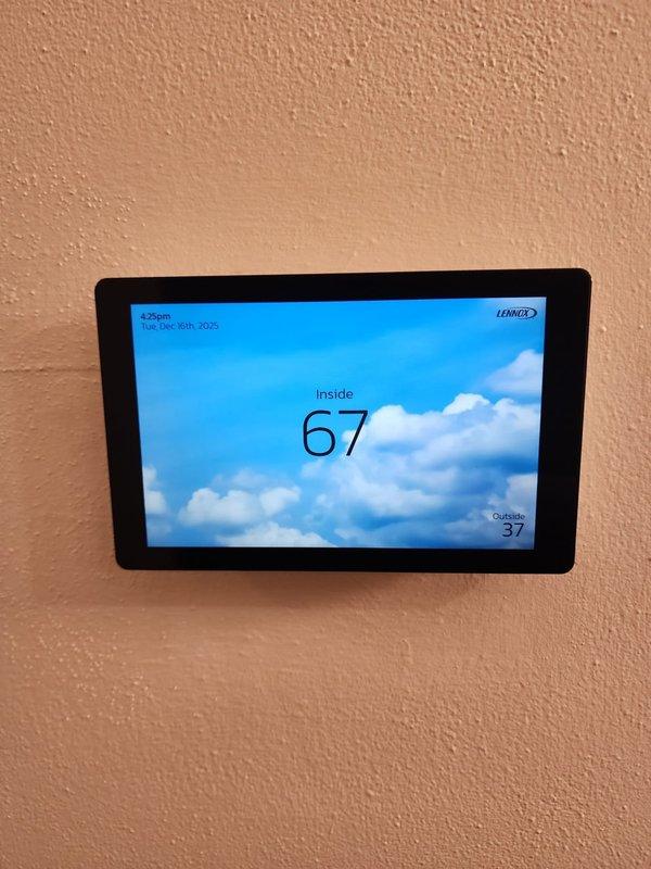 Completed installation of a complete Lennox HVAC system, including proper installation of ductwork in the basement and connection of all necessary plumbing components. Mounted and programmed a new Lennox digital thermostat, confirming proper system operation with successful temperature reading and control functionality.