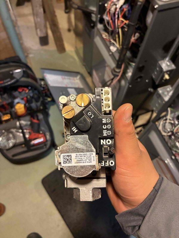 Replaced defective gas valve on customer's furnace after diagnosing intermittent heating failures. Removed old valve, installed new OEM replacement, and reconnected all wiring per manufacturer specifications. System tested with multiple heating cycles and confirmed proper ignition and flame sensing operation.