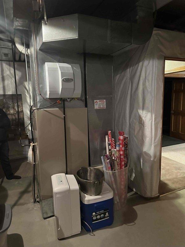 Conducted comprehensive evaluation of existing HVAC system in residential basement. Documented aged furnace with deteriorating ductwork and outdated humidifier system requiring replacement. Recommended complete HVAC system upgrade including high-efficiency furnace unit, properly sized ductwork, and modern humidity control system to improve home comfort and energy efficiency.
