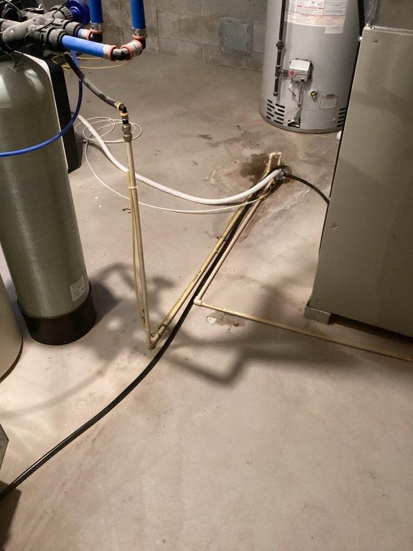 Completed installation of new furnace with system pressurization verified at 1653 on UEi EM201B meter. Ensured proper integration with existing utility room infrastructure including water heater and treatment systems. Final inspection confirmed all connections secure and system operating within specifications.