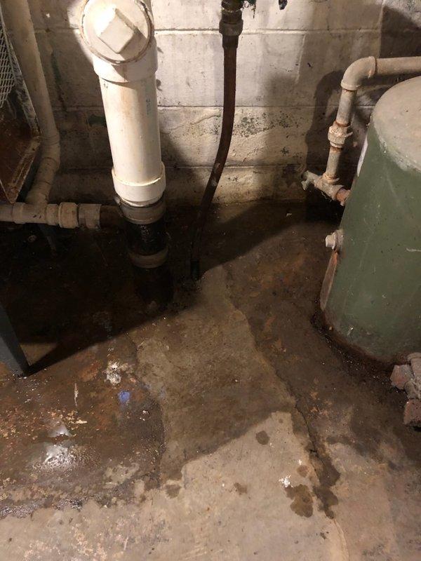 Responded to service call regarding frozen pipes. Inspected basement utility area showing signs of moisture damage where several pipes were affected. Found inadequate insulation around plumbing in structural areas with exposed fiberglass insulation and improper gaps around horizontal pipe runs. Thawed frozen pipes, checked for leaks around water heater connections, and installed additional pipe insulation to prevent future freezing issues.