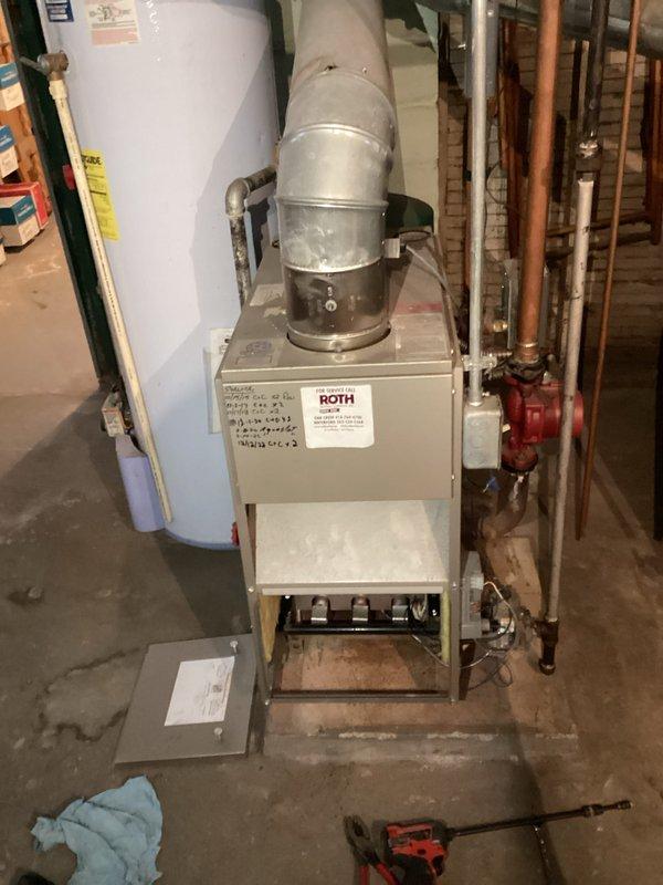 Performed comprehensive tune-up on Carrier furnace system and Roth oil-fired water heater. Cleaned and inspected all critical components including heat exchanger, burners, and ductwork connections. Checked operation of safety controls and verified proper combustion efficiency. Both units are functioning within manufacturer specifications with no immediate concerns identified.