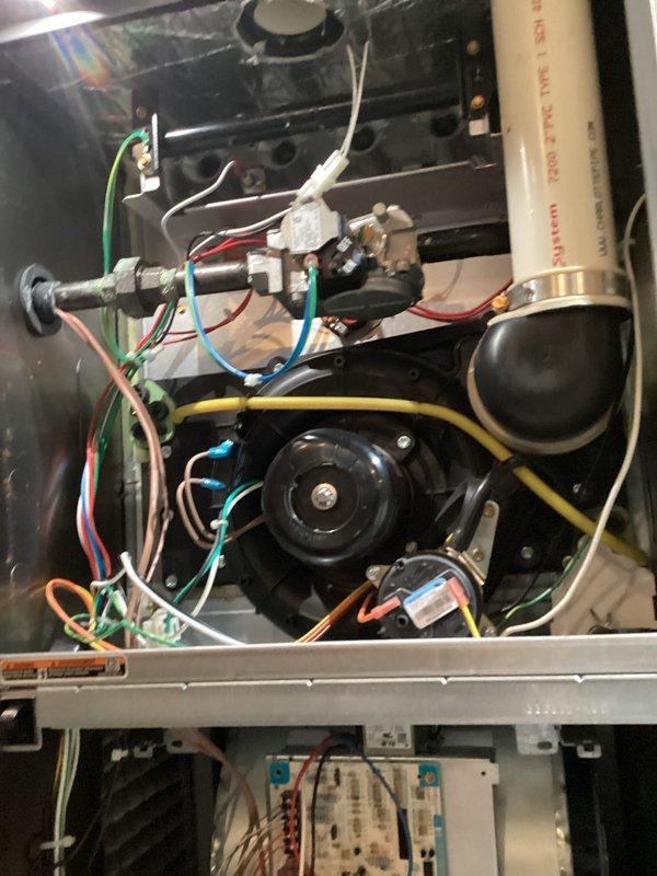 Performed seasonal preventative maintenance on the HVAC system. Inspected and cleaned interior components including the blower motor, control board, and electrical connections. Examined basement ductwork and PVC ventilation/drainage pipes for proper installation and function. All systems operating within normal parameters after service.