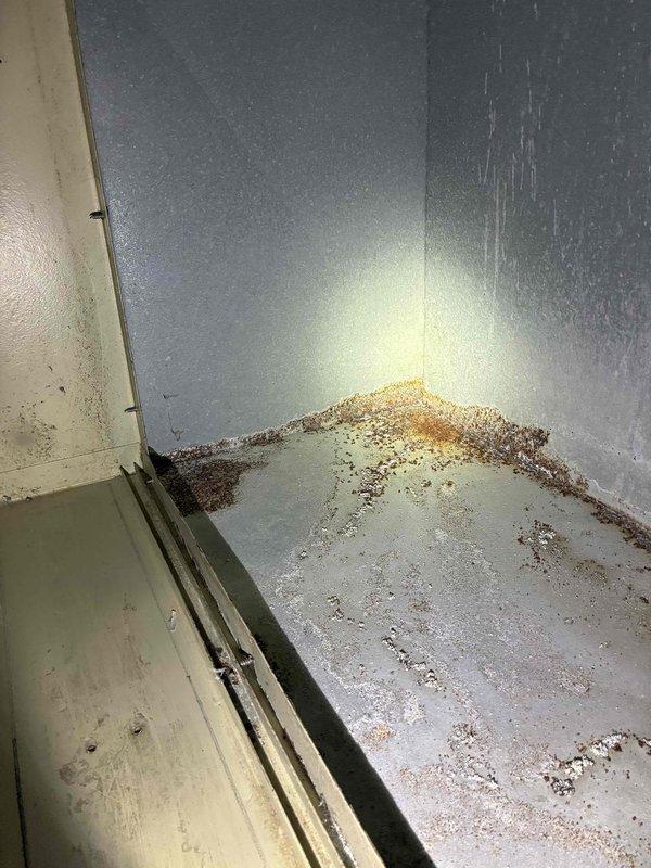 Completed a routine annual maintenance tune-up on a Lennox furnace system located in the utility room. Inspected all components and connections including the ventilation PVC piping, electrical connections, and mounting structure. Identified corrosion damage in the lower cabinet corner, likely due to moisture accumulation, and documented with photos for reference. System is operational but recommend monitoring the rust progression in the cabinet area.