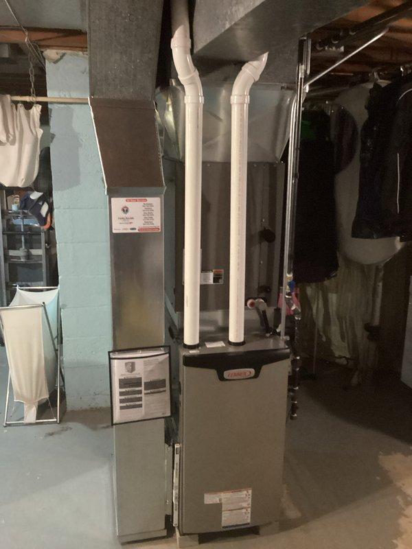 Successfully installed and commissioned a new Lennox furnace system in basement utility area. Completed professional installation of dual PVC vent pipes, drain lines, and all necessary electrical connections. System was tested and verified operational as evidenced by indicator light and proper function.