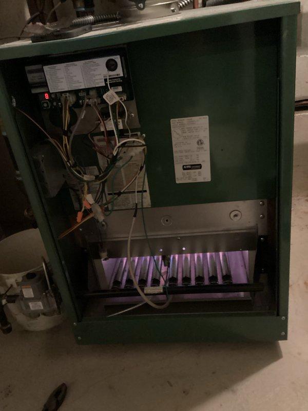 Performed comprehensive furnace tune-up including inspection of heat exchanger, control board operation, and electrical connections. System showed proper flame pattern with normal combustion sequence. Examined adjacent mechanical room piping system and insulation for proper installation and potential issues. All components functioning within specifications with no immediate concerns identified.