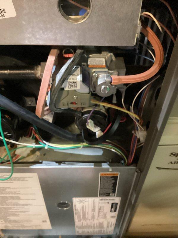 Performed comprehensive HVAC tune-up service, verifying proper gas line leveling and pressure using calibrated spirit level tool. Inspected furnace interior components including gas valve assembly, copper tubing connections, and electrical wiring, ensuring all connections were secure and functioning within manufacturer specifications.