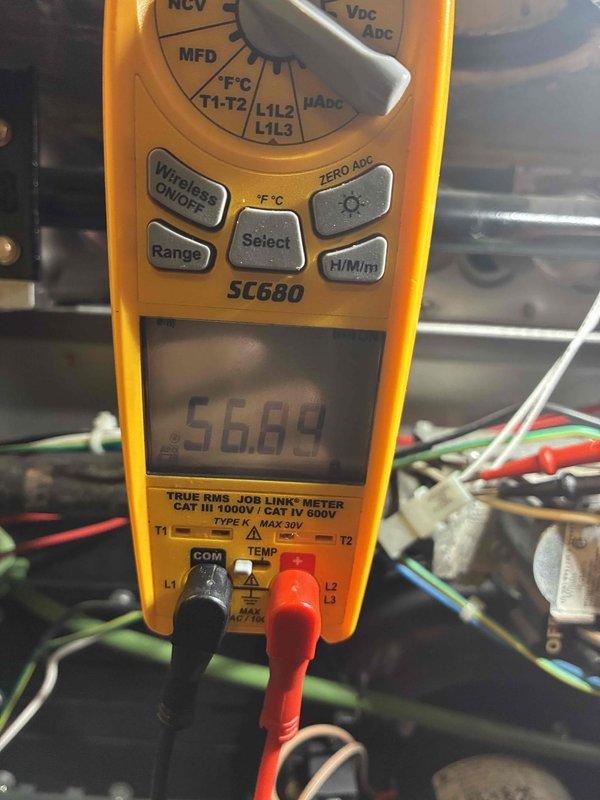 Performed comprehensive HVAC system tune-up including electrical diagnostics using Fieldpiece SC680 multimeter. Conducted amp draw measurements showing 0.31 amps during operation and verified system voltage at 56.89V. All electrical connections were inspected and readings were within manufacturer specifications.