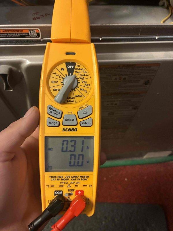 Performed comprehensive HVAC system tune-up including electrical diagnostics using Fieldpiece SC680 multimeter. Conducted amp draw measurements showing 0.31 amps during operation and verified system voltage at 56.89V. All electrical connections were inspected and readings were within manufacturer specifications.