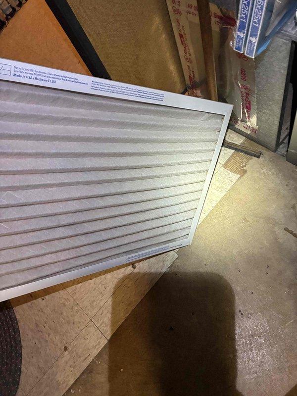 Performed seasonal maintenance tune-up on residential HVAC system including inspection of Honeywell thermostat (verified proper operation in heating mode with 68° current/71° setpoint). Replaced standard pleated air filter with new unit to ensure optimal airflow and system efficiency.