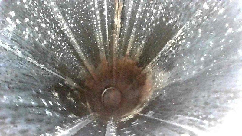 Completed routine HVAC tune-up service with inspection of ductwork. Identified significant rust and particulate buildup in ventilation system. Recommended duct cleaning service to address corrosion issues and improve airflow efficiency.