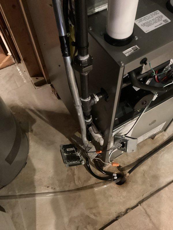 Successfully installed a new HVAC system in the utility area, featuring a furnace unit with proper PVC exhaust venting. Connected all necessary gas lines, electrical components, and conduits according to manufacturer specifications, ensuring proper integration with the existing Rheem water heater system.