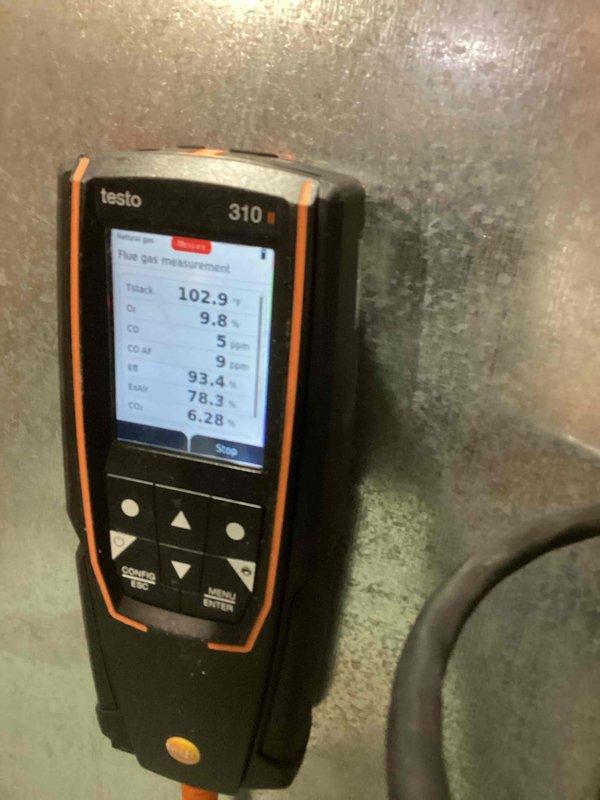 Performed scheduled tune-up on Bryant HVAC system. Removed front panel to access internal components for comprehensive inspection and testing. Utilized Testo 310 analyzer to evaluate combustion efficiency, with readings showing optimal performance (O2: 9%, CO2: 6.28%, efficiency: 93.4%). All internal components including blower motor, circuit board, and electrical connections were inspected and found to be in proper working condition.