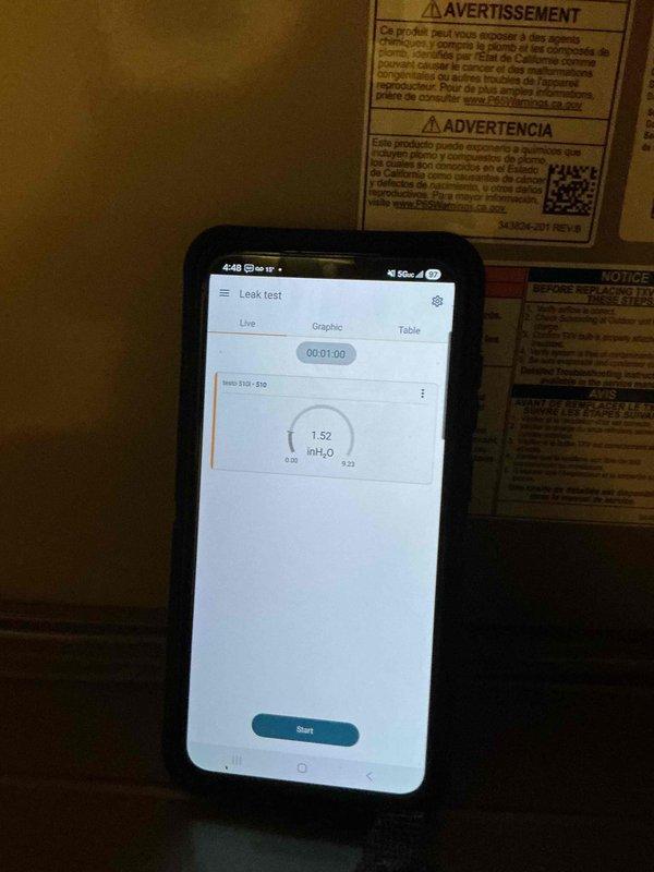 Performed leak detection test on HVAC system using pressure diagnostics, identifying a 1.52 inH₂O reading during a timed test. Discovered and documented compromised ductwork insulation with visible cavity/opening that could affect system efficiency and indoor air quality.