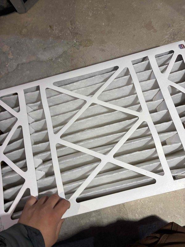 Performed routine air filter replacement with new Honeywell 16x25x4 filter. Conducted temperature diagnostic testing using digital thermometer, confirming system operating temperature at 64.2°F, which falls within normal operational parameters. All HVAC components inspected and system functioning properly after service completion.