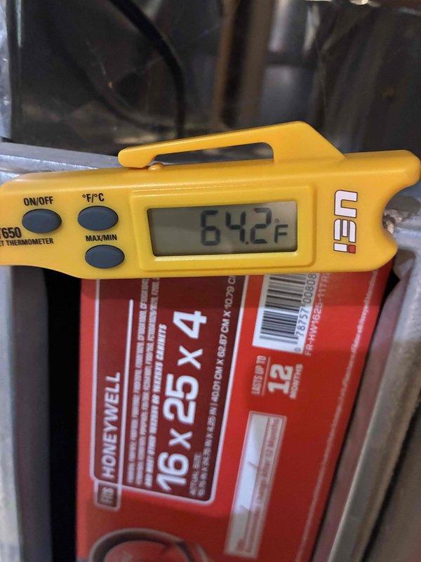 Performed routine air filter replacement with new Honeywell 16x25x4 filter. Conducted temperature diagnostic testing using digital thermometer, confirming system operating temperature at 64.2°F, which falls within normal operational parameters. All HVAC components inspected and system functioning properly after service completion.