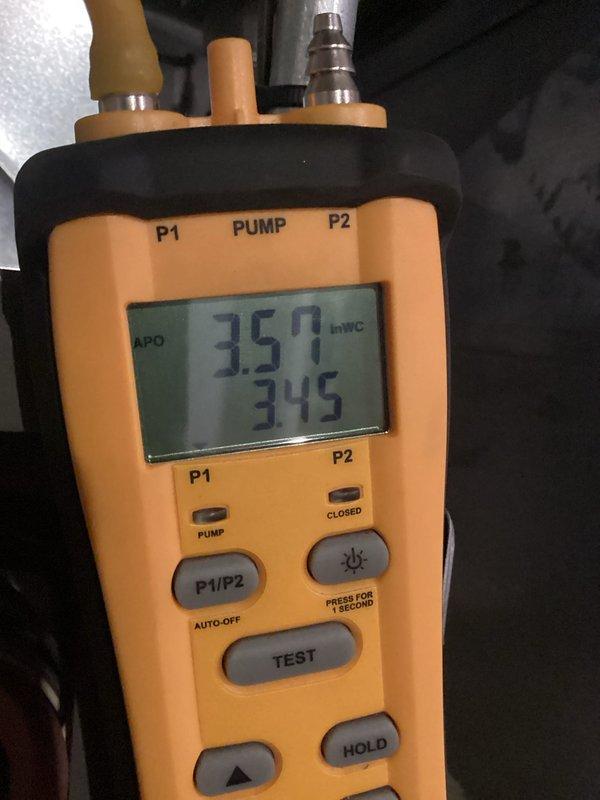 Performed comprehensive furnace tune-up which included removing access panel for full component inspection. Conducted electrical testing with clamp meter to verify proper voltage and amperage readings on control board and wiring connections. Measured gas pressure using digital manometer, confirming readings of 3.50/3.45 inWC, which are within manufacturer specifications for this unit. All diagnostic tests indicate system is operating correctly with no issues detected.