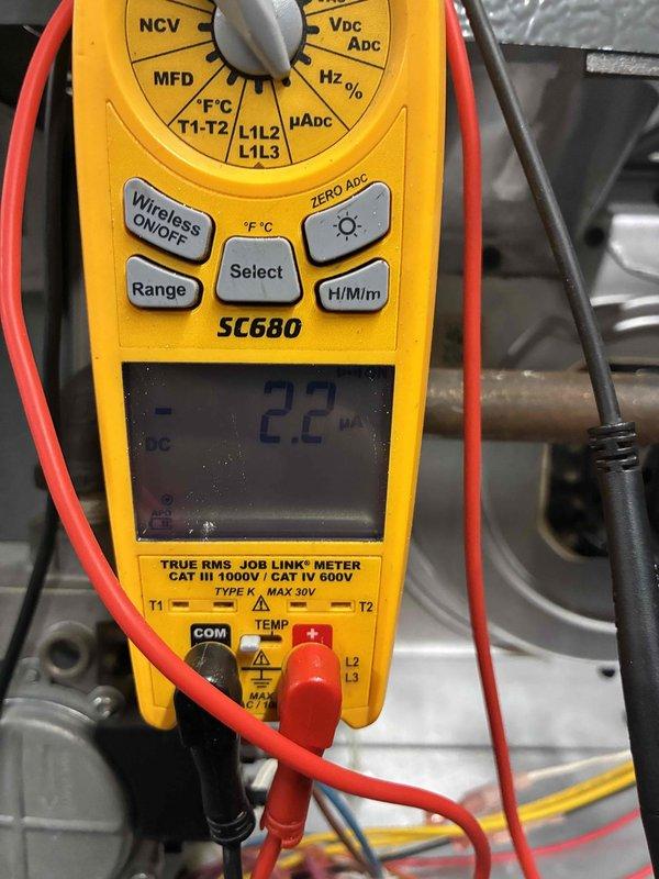 Conducted complete HVAC tune-up service including electrical diagnostics using Fieldpiece SC680 multimeter, which displayed a reading of 2.2 (negative). System temperature was verified at 50.5°F using UEI PDT85A digital thermometer, confirming proper operation within normal parameters.
