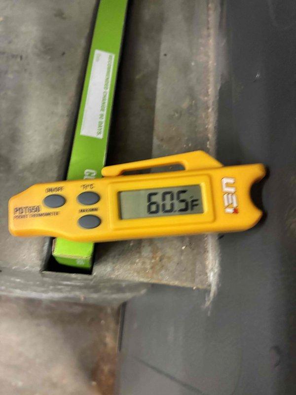 Conducted complete HVAC tune-up service including electrical diagnostics using Fieldpiece SC680 multimeter, which displayed a reading of 2.2 (negative). System temperature was verified at 50.5°F using UEI PDT85A digital thermometer, confirming proper operation within normal parameters.