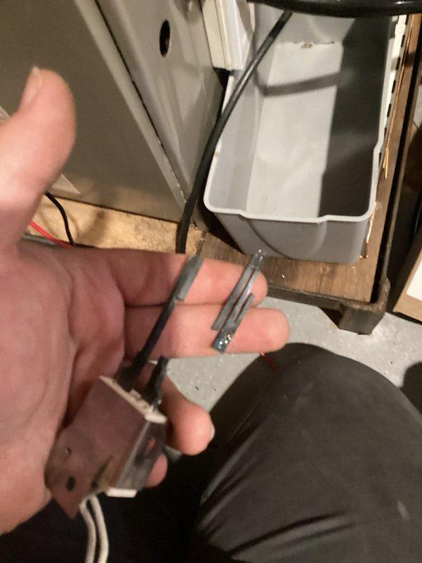 Performed diagnostic assessment on aging furnace with no heat complaint. Located disconnected electrical terminals causing burner failure. Reconnected wiring to control board and verified proper flame sequence. System is now operating correctly with strong blue flame pattern across heat exchanger.