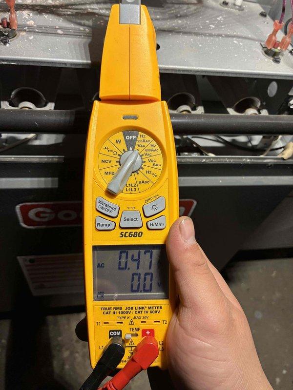 Performed standard HVAC tune-up service including electrical inspection with SC680 clamp meter showing acceptable amperage readings of 0.47A. Conducted temperature differential testing with UEi DT650 thermometer, recording 62.6°F at supply register. System operating within normal parameters with no major issues detected.