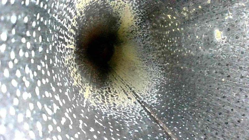 Performed routine preventative maintenance on Daikin furnace system. Inspected interior ductwork revealing minor dust accumulation and some yellowish-brown residue buildup on interior surfaces. Cleaned accessible components and verified proper operation of intake and exhaust PVC ventilation pipes.