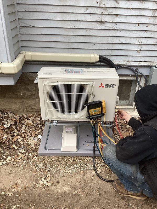Successfully installed and commissioned a Mitsubishi Electric mini-split heat pump system with R454B refrigerant. Properly mounted the outdoor condenser unit on appropriate bracket against exterior wall with PVC line set cover and completed pressure testing. Performed final system checkout with manifold gauges to verify proper refrigerant charge and operation per manufacturer specifications.