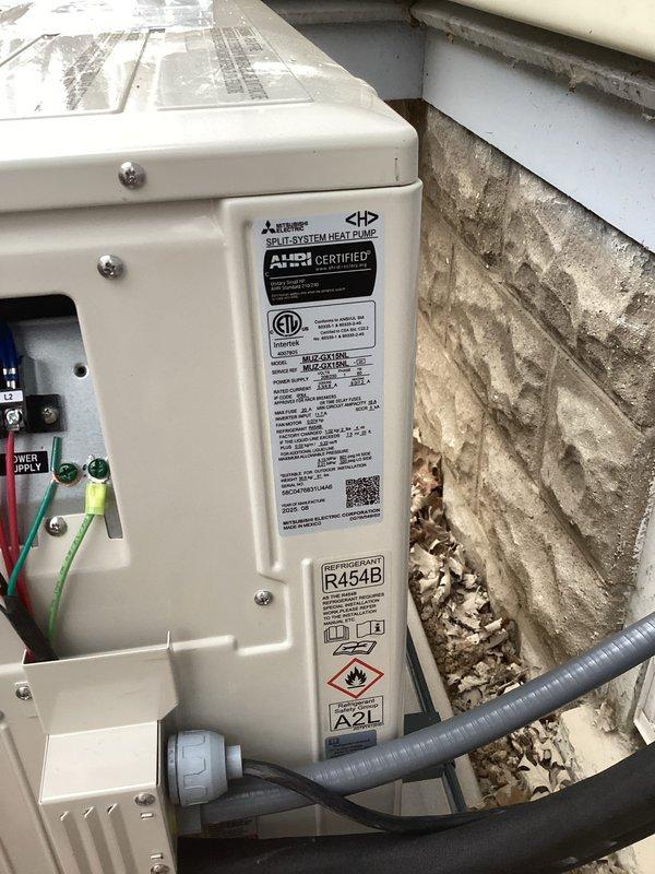 Successfully installed and commissioned a Mitsubishi Electric mini-split heat pump system with R454B refrigerant. Properly mounted the outdoor condenser unit on appropriate bracket against exterior wall with PVC line set cover and completed pressure testing. Performed final system checkout with manifold gauges to verify proper refrigerant charge and operation per manufacturer specifications.
