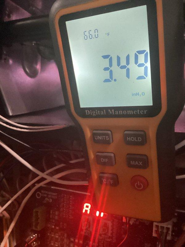 Completed installation of new furnace system with proper manometer testing confirming optimal static pressure readings of 3.49 inH₂O at 66.0°F. Successfully mounted and connected humidifier unit to the existing ductwork with copper piping and brass fittings, ensuring proper integration with the home's HVAC system.