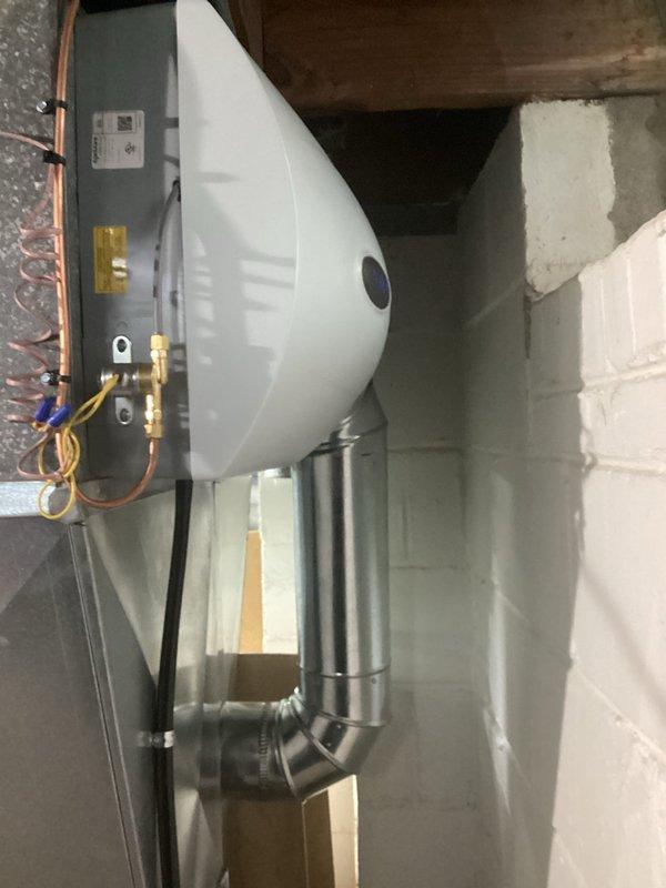 Completed installation of new furnace system with proper manometer testing confirming optimal static pressure readings of 3.49 inH₂O at 66.0°F. Successfully mounted and connected humidifier unit to the existing ductwork with copper piping and brass fittings, ensuring proper integration with the home's HVAC system.